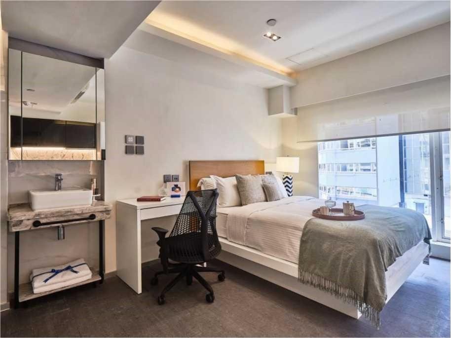 V Causeway Bay Aparthotel Хонконг Екстериор снимка