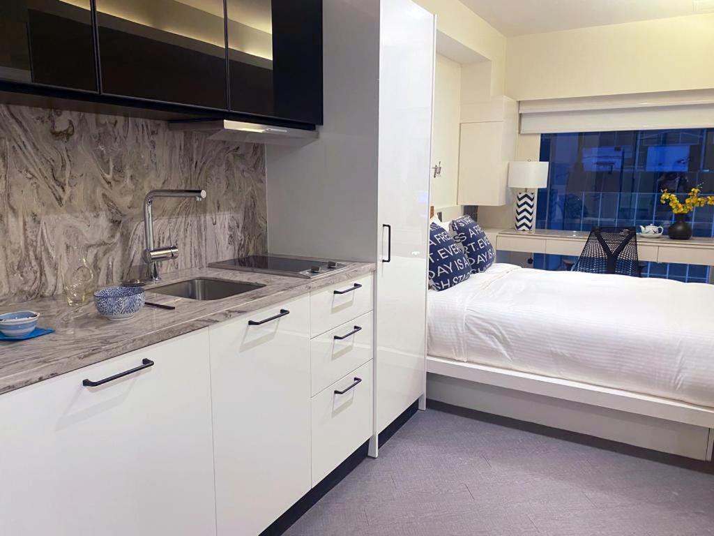 V Causeway Bay Aparthotel Хонконг Екстериор снимка